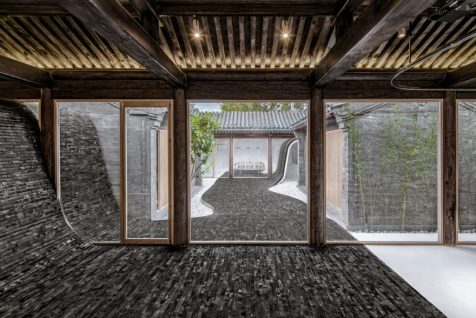 La Twisting Courtyard House moderniza la esencia del viejo Pekín