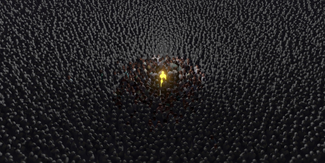 hombre amarillo rodeado de infinidad de personas