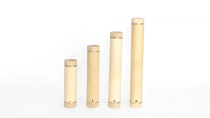 pesas de madera de arce que esconden en su interior un núcleo de hierro