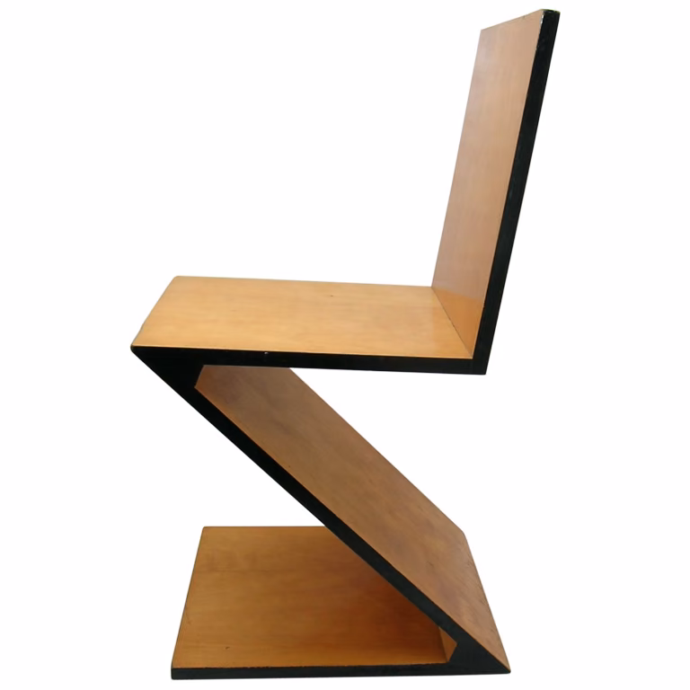 Silla Zig-Zag de Gerrit Rietveld de madera formada por cuatro planos en Z