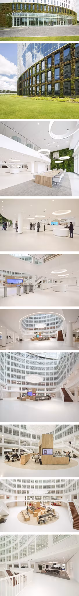 Eneco Headquarters en Rotterdam Varias vistas de la sede de Eneco en Rotterdam: fachada curva, atrio blanco luminoso y plantas de oficinas abiertas