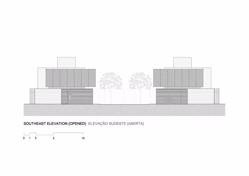 Alzado sudeste de las Casas AV de Corsi Hirano Arquitetos con el patio abierto entre los dos bloques