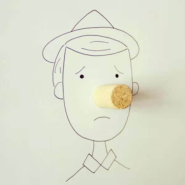 Ilustración de Cintascotch: un tapón de corcho hace de nariz de un hombre triste con sombrero