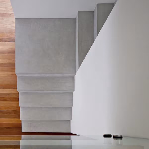Downward view showing the staircase leading to bedrooms area