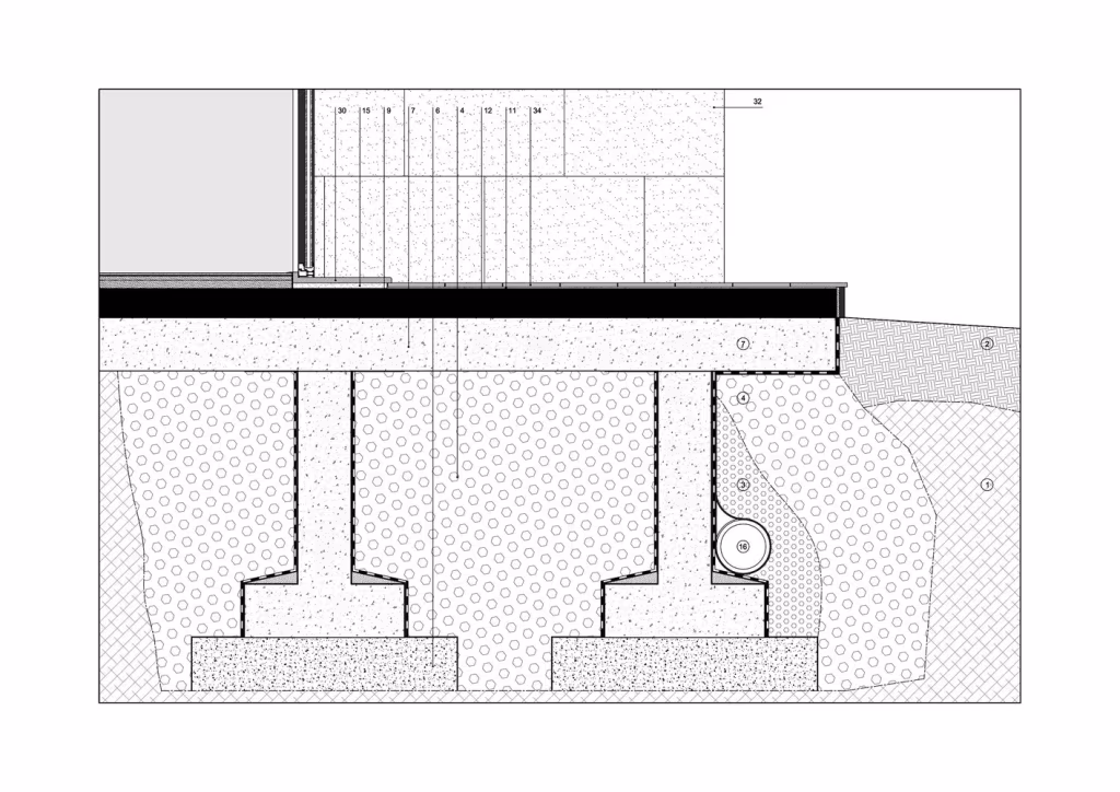 Detalle constructivo 2 de la Hill Cork House con zapatas de cimentación y forjado