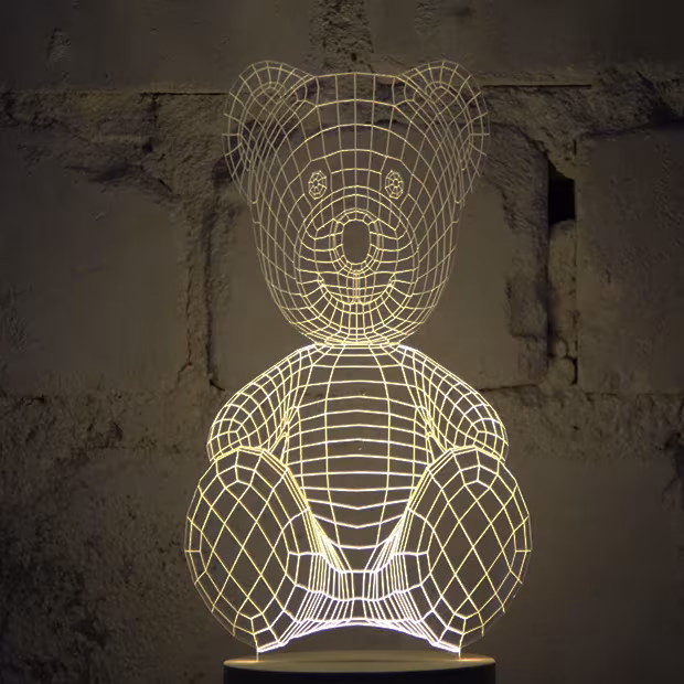 Lámpara acrílica de Nir Chehanowski con forma de osito de peluche que parece tridimensional al encenderse