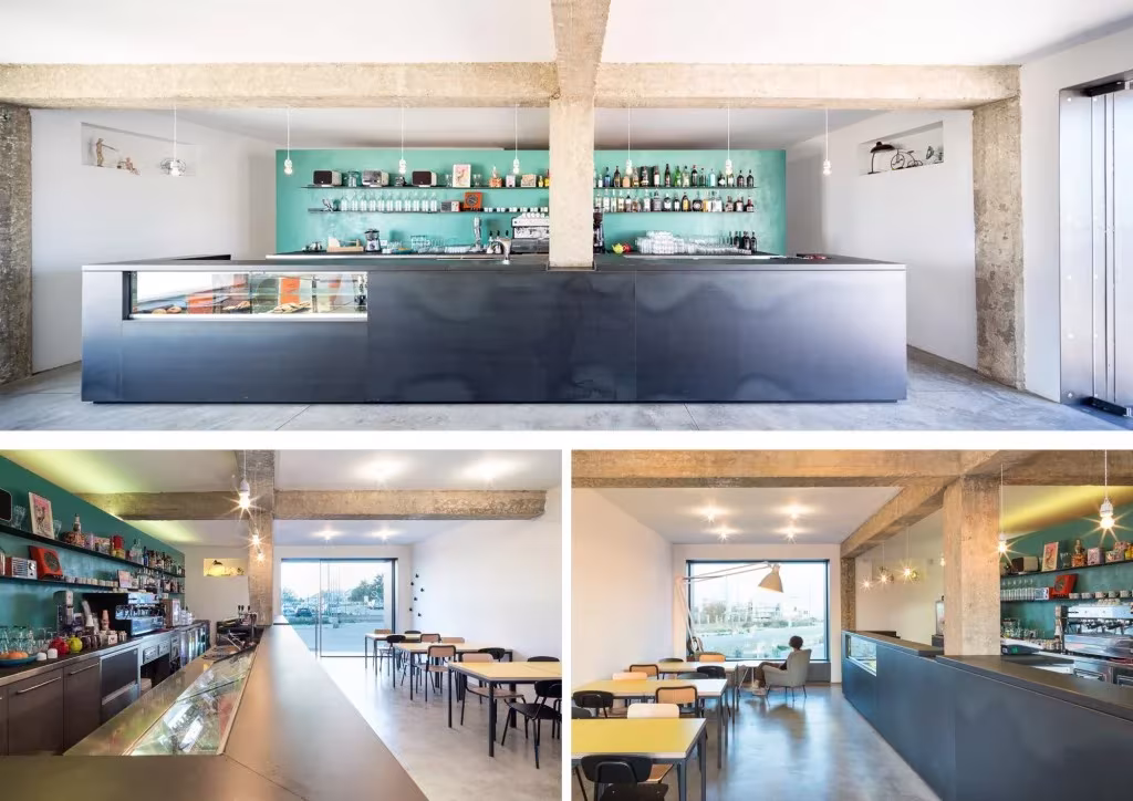 Eco Bar de Giuseppe Gurrieri en Ragusa con barra metálica, estantes verde agua y mesas de madera
