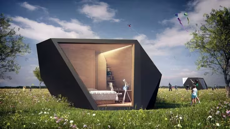 Recreación de Tetra Shed como dormitorio en un prado florido, con niños y cometas al fondo