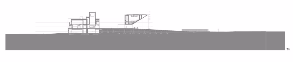 Sección transversal T8 de la ESTIG de Beja sobre el perfil del terreno, con el cuerpo en voladizo a la izquierda