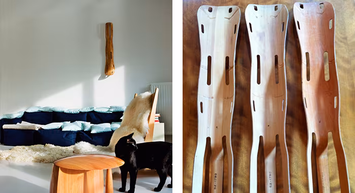 Rincón con piel y banco de madera junto a unas férulas de madera laminada diseñadas por los Eames