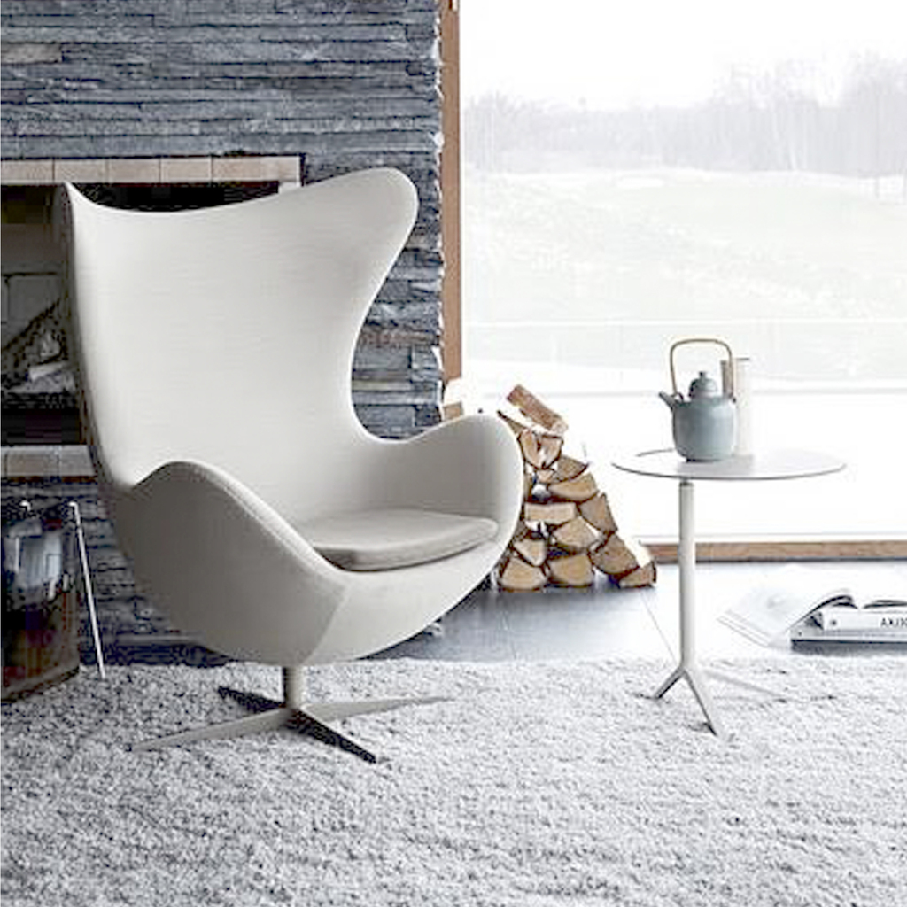 detalle butaca egg en piel blanca diseñada por arne jacobsen