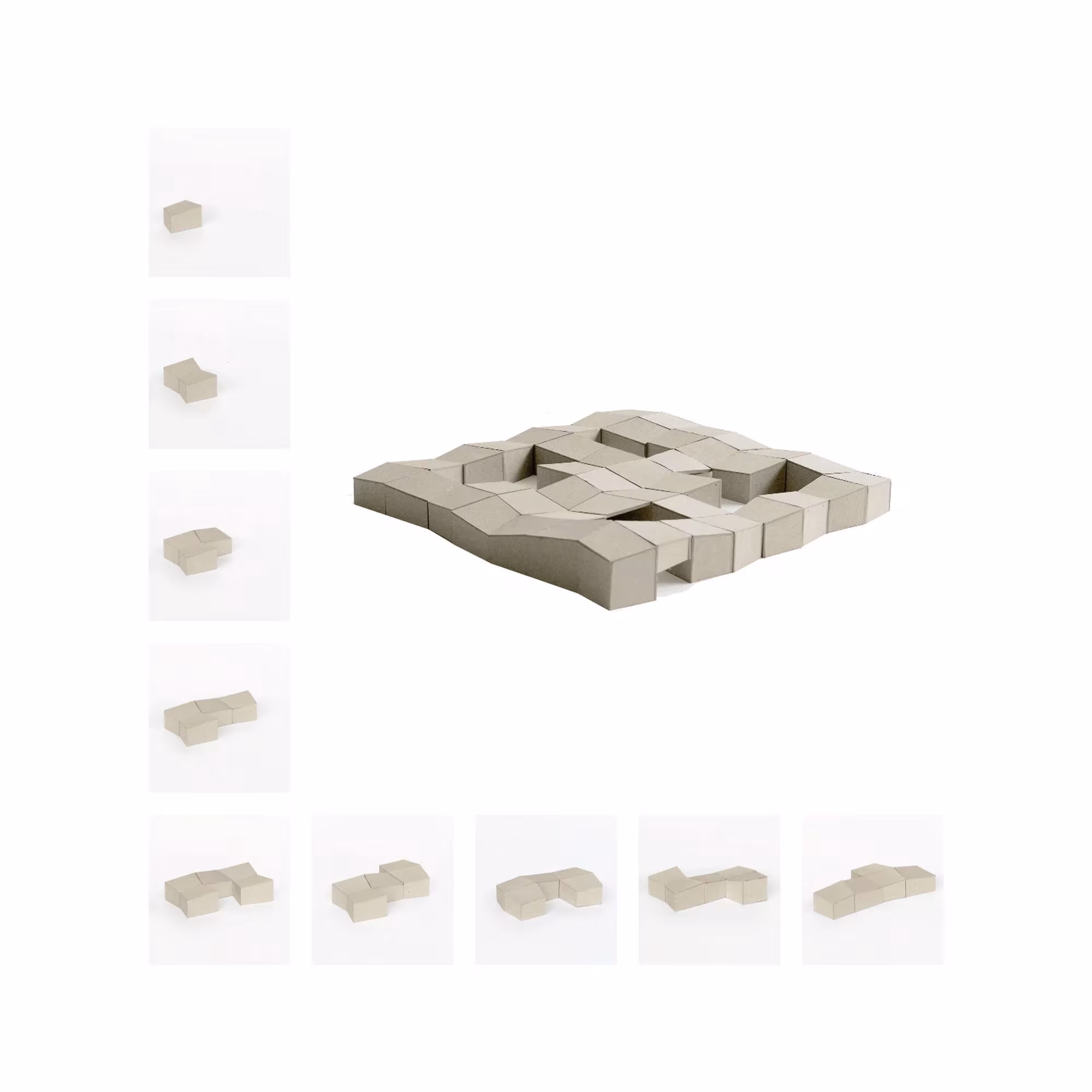 Maqueta de piezas trapezoidales encajadas como un puzle, con los módulos sueltos, del Kindergarten Cassarate