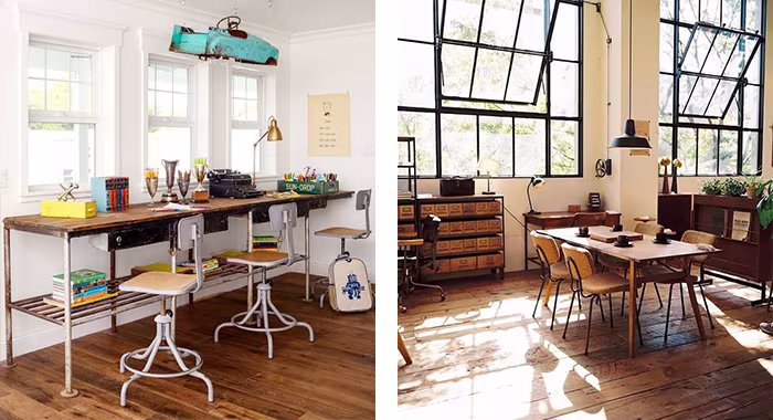 Estancias vintage con mesas de taller de madera, taburetes metálicos y grandes ventanales de hierro