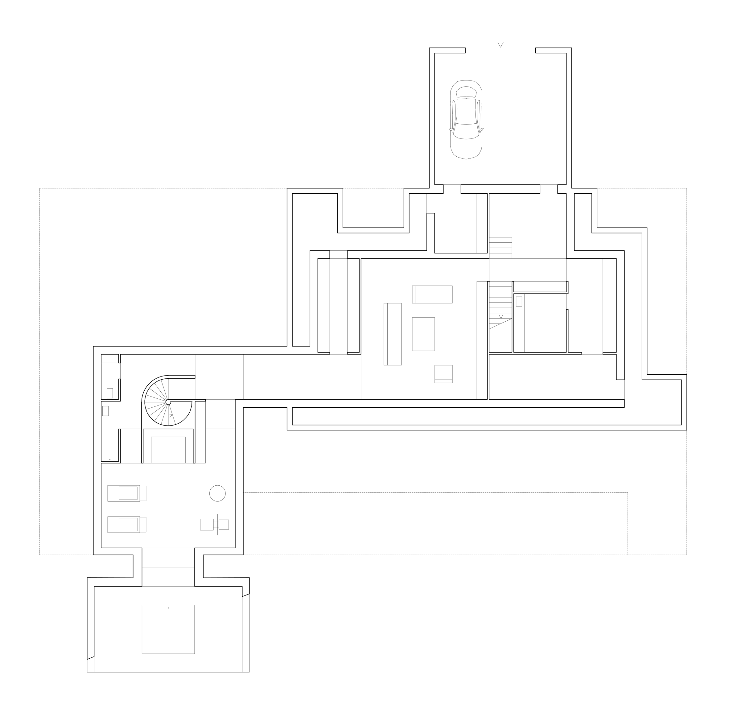 Planta del nivel inferior de la AP House de GGA Architects con garaje, escalera helicoidal y estancias semienterradas