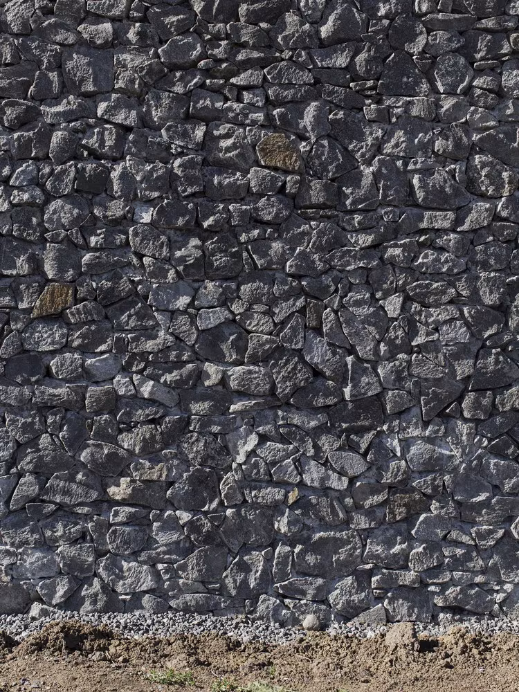 Textura de dolerita del muro exterior de D'Entrecasteaux House, una roca de 180 millones de años