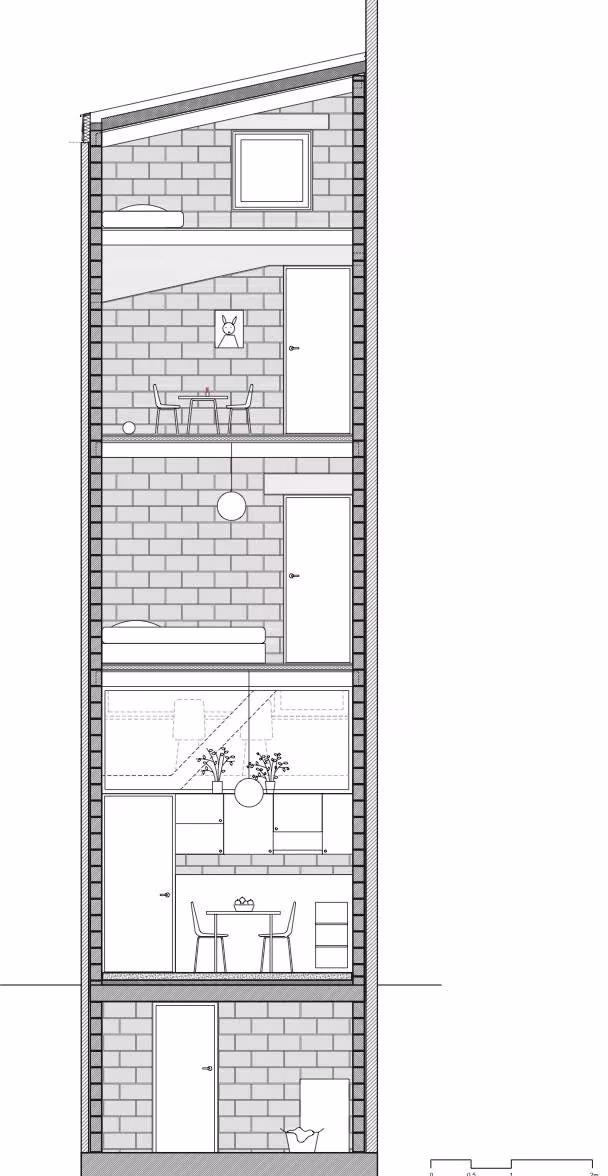 Sección transversal de la Casa 12k con salón, dormitorios y cubierta inclinada de bloque