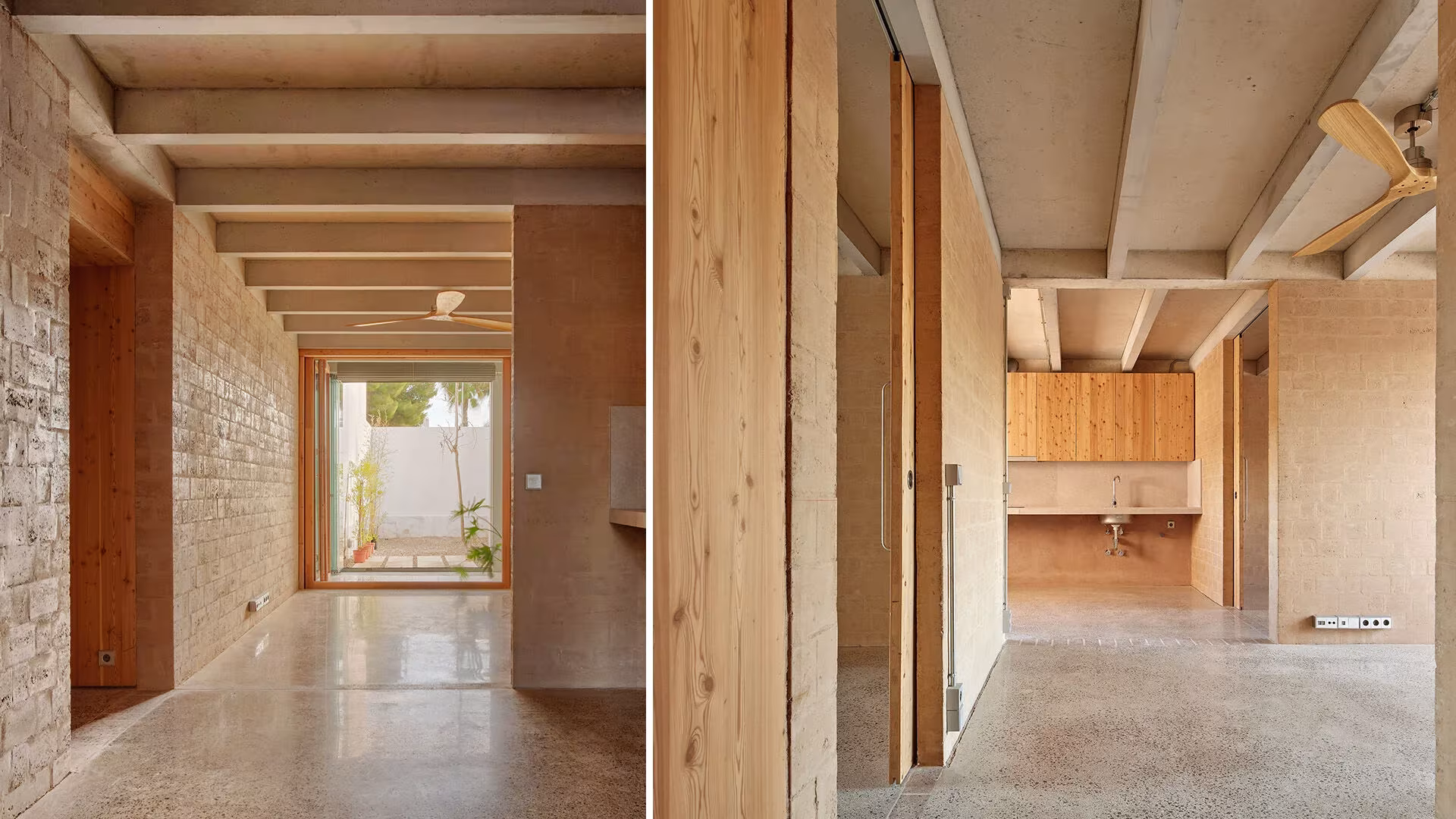 Interior de una vivienda de Ibiza con muros de tierra comprimida, vigas de madera y suelo continuo