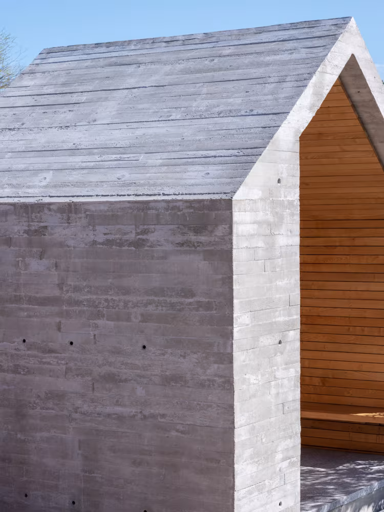 ABATON-Panteon-15 Front of the El Panteón chapel in board-marked concrete with a timber-lined interior