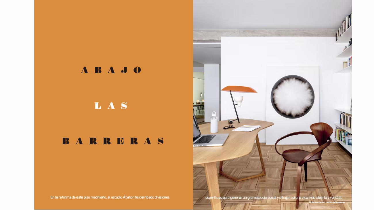 «Abajo las barreras» feature showing an ÁBATON study with a curved wooden desk and red lamp