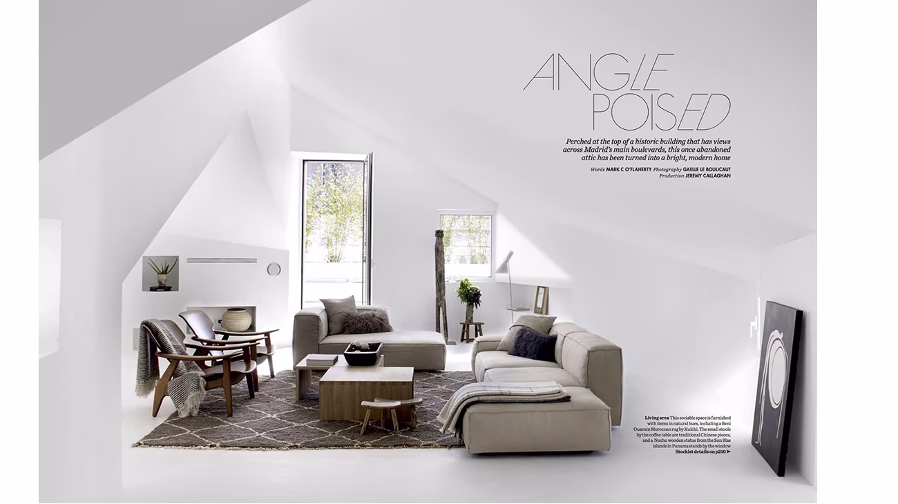 «Angle Poised» feature in Elle Decoration UK showing a white ÁBATON attic living room