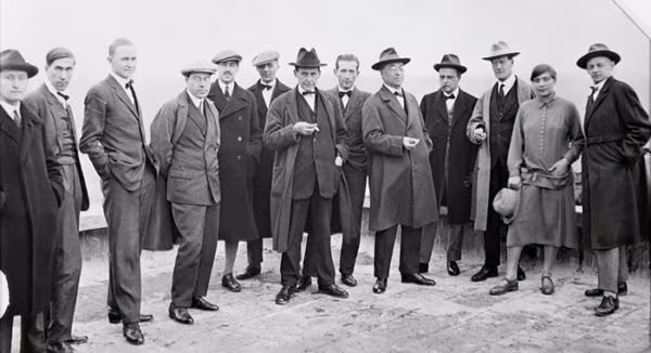 Bauhaus masters posing together in a historic black and white photograph