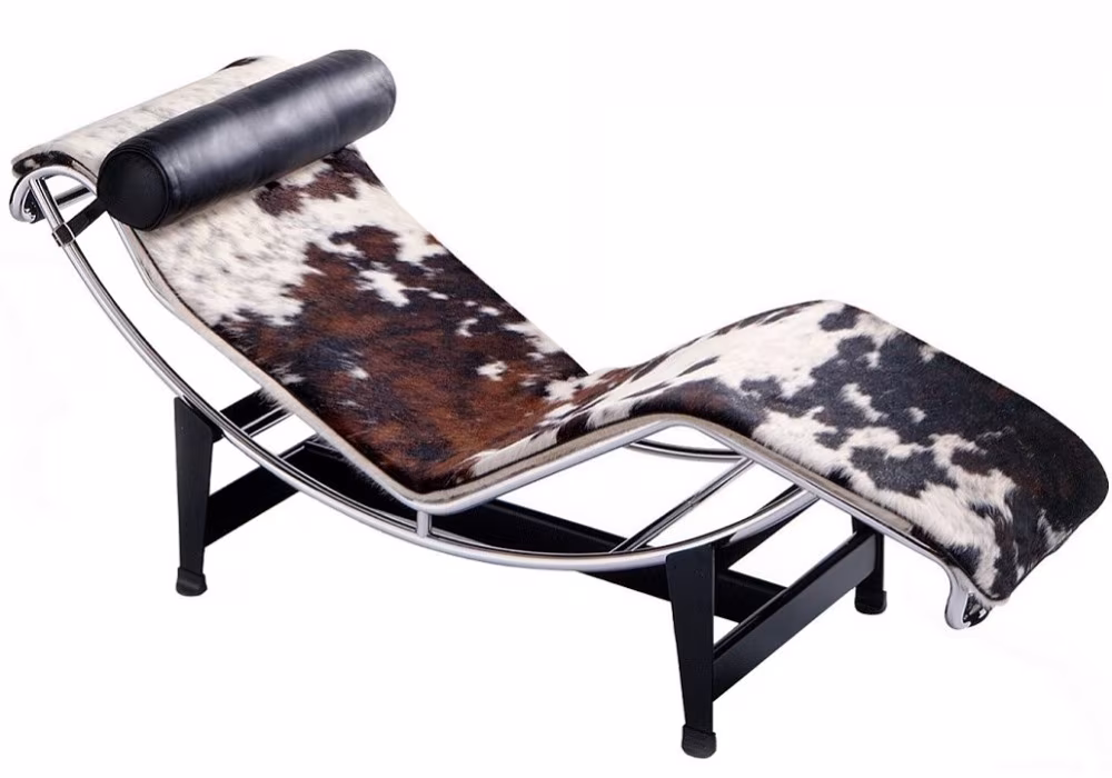 Le Corbusier LC4 chaise longue for Cassina with cowhide upholstery and a black bolster