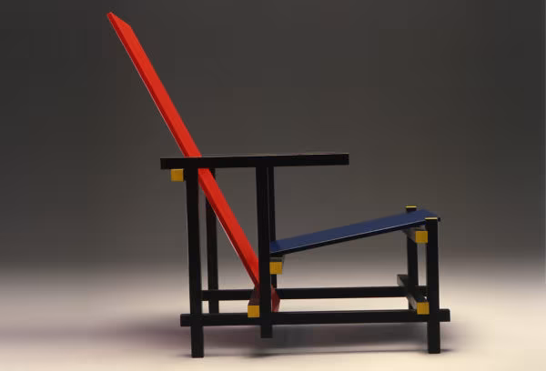 Gerrit Rietveld Red and Blue chair with red and blue boards on a black frame